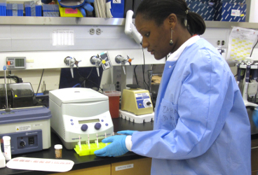 A technician prepares lab samples for testing